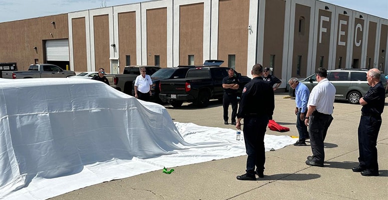 demonstration of the electric car fire blanket